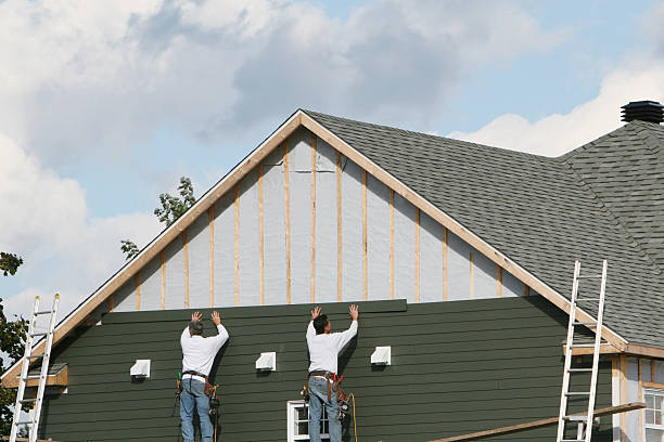 Professional Storm Damage Siding Repair technician working in Laneview, VA